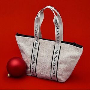 Victoria’s Secret ivory faux fleece zipper closure logo double strap tote. NWT.